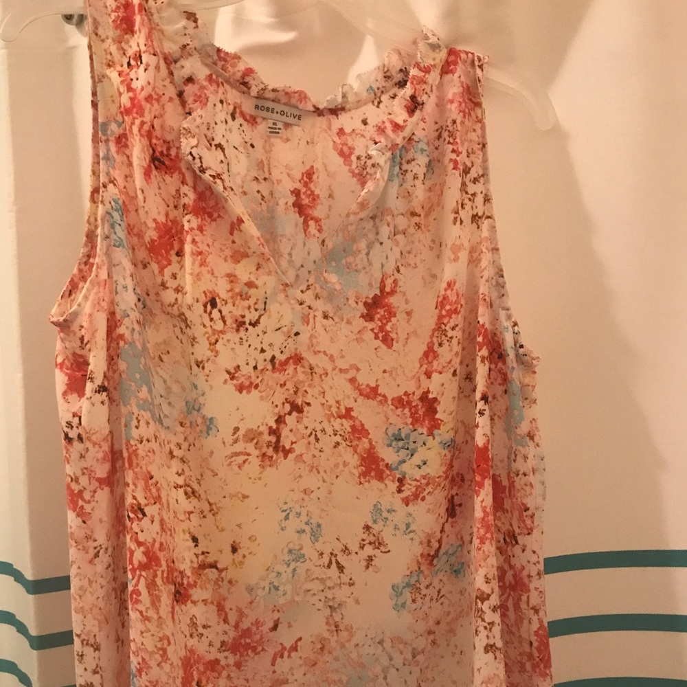 Rose +Olive Sleeveless top. Ruffles and floral